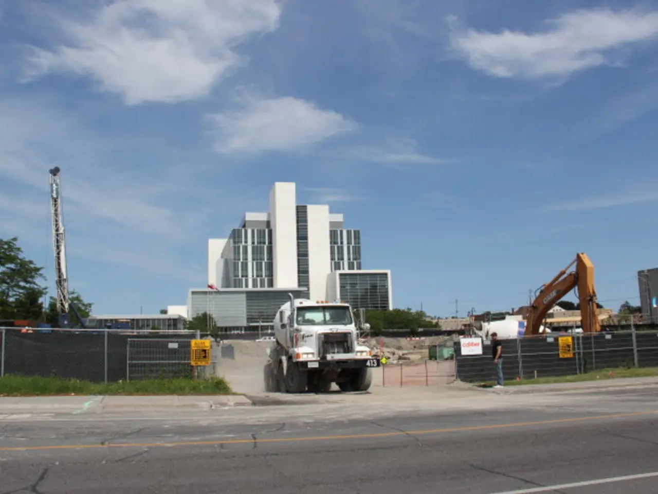 This image consists of a truck in white color. At the bottom, there is a road. On the right, we can...