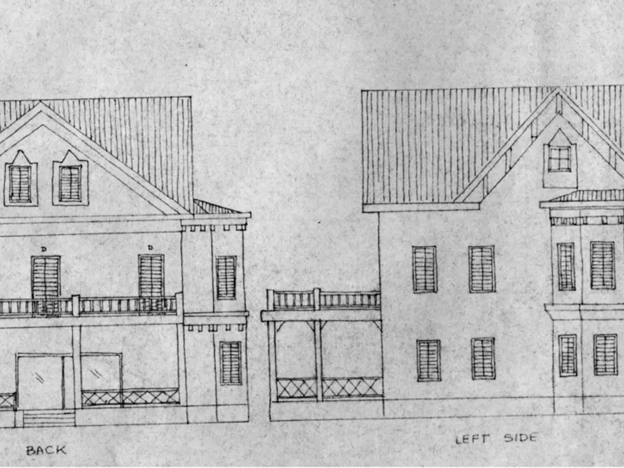 In this picture we can see a drawing of houses and some text.