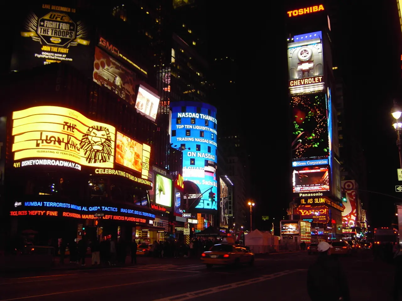 This picture is clicked on the road. tHere are vehicles moving on the road. Beside the road there...