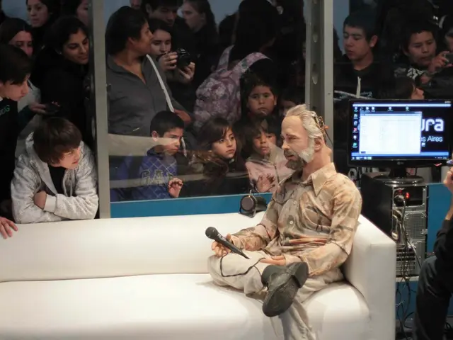 In this picture we can see a group of people standing and taking pictures of a puppet show were...