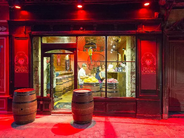 In this image it seems like a store in the middle. In the store there are few people who are...