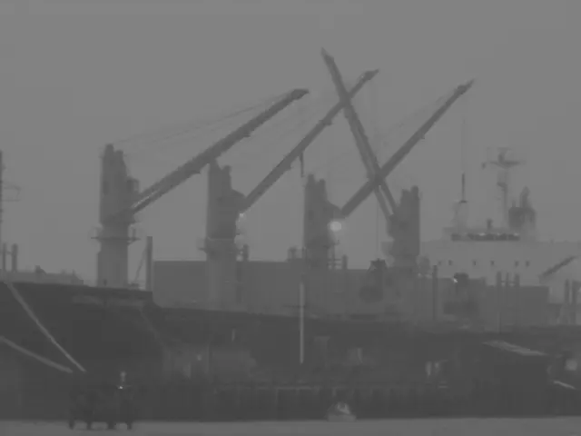 In this image there is a ship on a sea.
