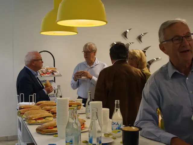 there are so many people standing behind the table where food is served on the plate with some...